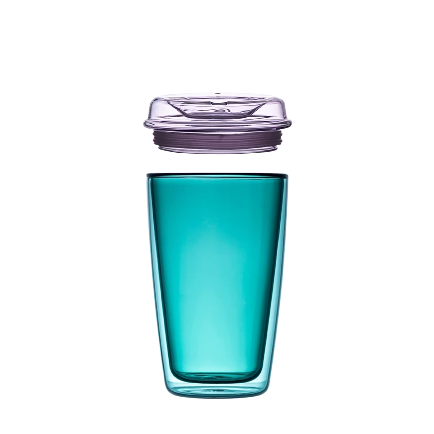 Turquoise tumbler with a purple lid on a white background
