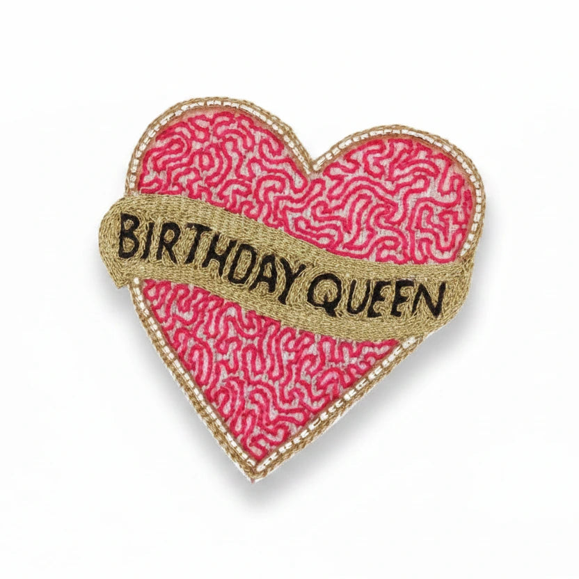Heart-shaped patch with 'Birthday Queen' text on a white background