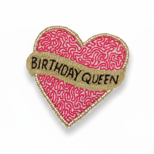 Heart-shaped patch with 'Birthday Queen' text on a white background