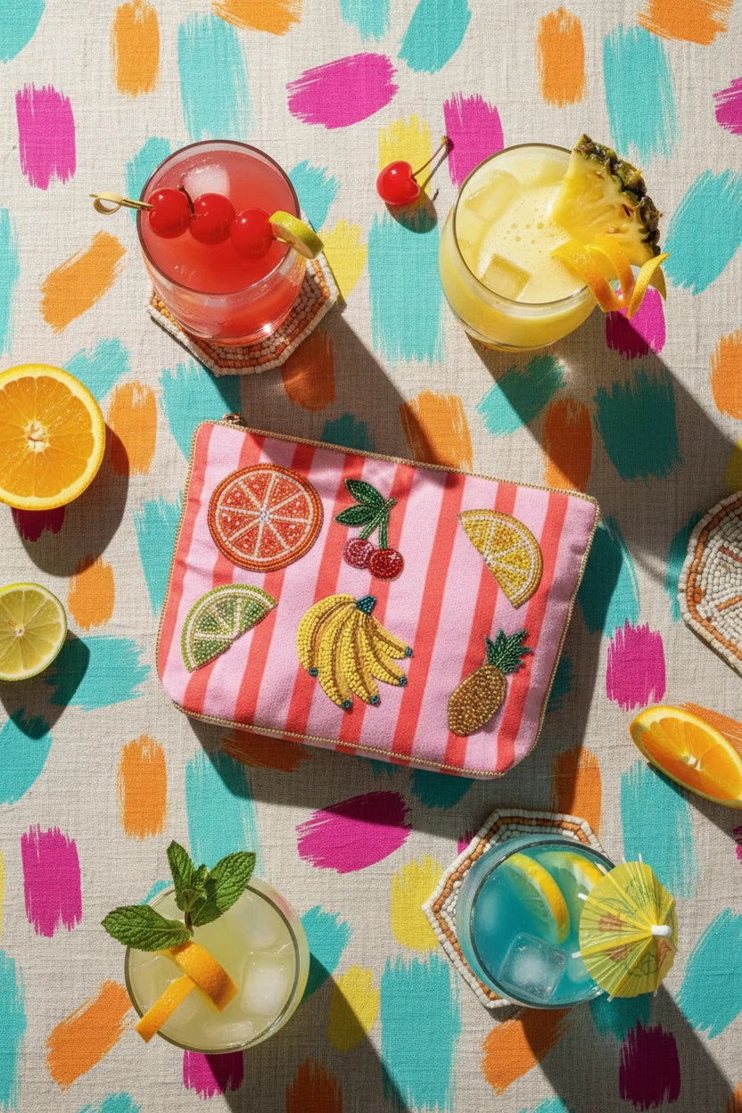 Striped pouch with fruit designs on a white background